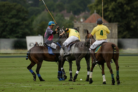 La Tremenda (lilac) v Maiz Dulce (yellow) in a Brecknock Cup polo match played on Lawns 1 at the Cowdray Park Polo Club on Tuesday 13 August 2013