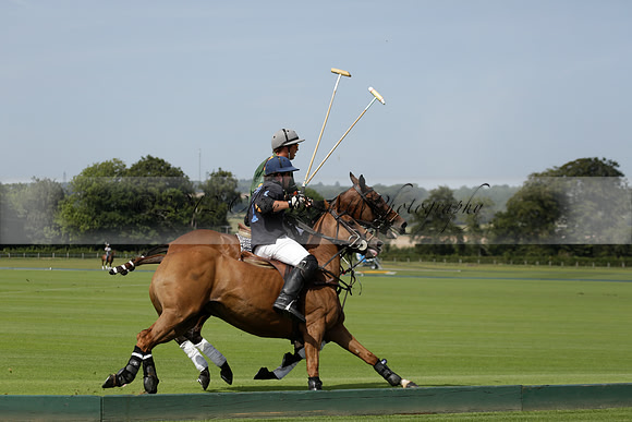 Maiz Dulce (green) v River (blue) in a Uber Polo Midsummer 12 goal polo match on Wednesday 21 August 2013 at Cowdray park Polo Club on Ambersham 2.  www.polopictures.co.uk