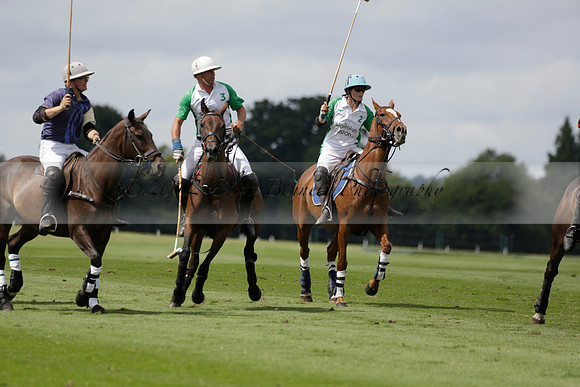 Burningfold (blue) v Wairakei Pastoral (green) in the Ruins Cup Final on Sunday 04 August 2013.
