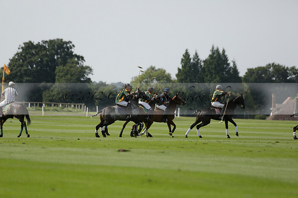 Maiz Dulce (green) v River (blue) in a Uber Polo Midsummer 12 goal polo match on Wednesday 21 August 2013 at Cowdray park Polo Club on Ambersham 2.  www.polopictures.co.uk