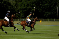 Maiz Dulce (green) v River (blue) in a Uber Polo Midsummer 12 goal polo match on Wednesday 21 August 2013 at Cowdray park Polo Club on Ambersham 2.  www.polopictures.co.uk