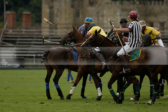 La Tremenda (lilac) v Maiz Dulce (yellow) in a Brecknock Cup polo match played on Lawns 1 at the Cowdray Park Polo Club on Tuesday 13 August 2013