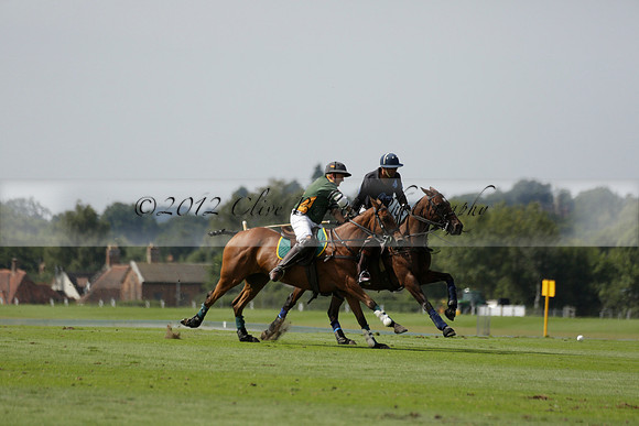 Maiz Dulce (green) v River (blue) in a Uber Polo Midsummer 12 goal polo match on Wednesday 21 August 2013 at Cowdray park Polo Club on Ambersham 2.  www.polopictures.co.uk
