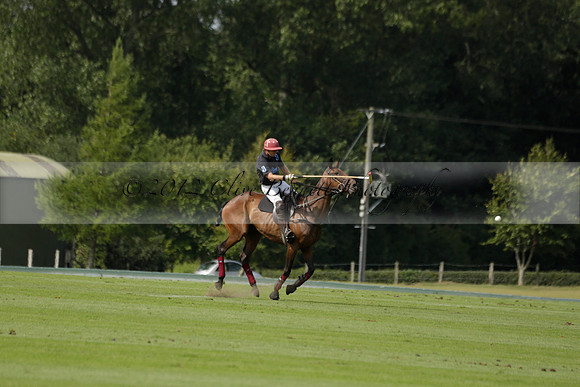 Maiz Dulce (green) v River (blue) in a Uber Polo Midsummer 12 goal polo match on Wednesday 21 August 2013 at Cowdray park Polo Club on Ambersham 2.  www.polopictures.co.uk