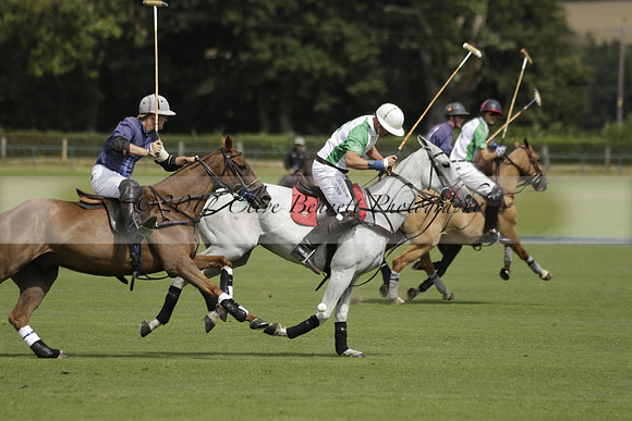 Burningfold (blue) v Wairakei Pastoral (green) in the Ruins Cup Final on Sunday 04 August 2013.