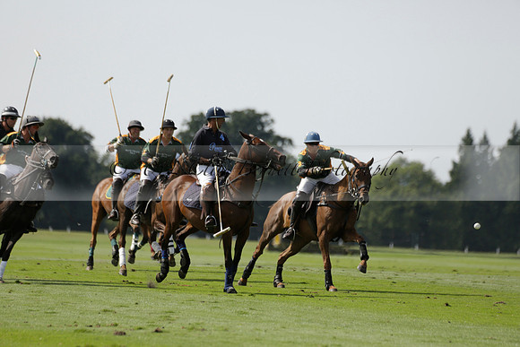 Maiz Dulce (green) v River (blue) in a Uber Polo Midsummer 12 goal polo match on Wednesday 21 August 2013 at Cowdray park Polo Club on Ambersham 2.  www.polopictures.co.uk