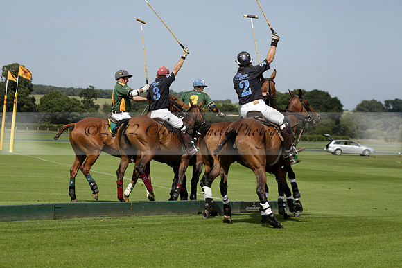 Maiz Dulce (green) v River (blue) in a Uber Polo Midsummer 12 goal polo match on Wednesday 21 August 2013 at Cowdray park Polo Club on Ambersham 2.  www.polopictures.co.uk