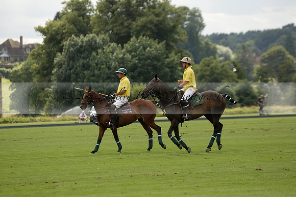La Tremenda (lilac) v Maiz Dulce (yellow) in a Brecknock Cup polo match played on Lawns 1 at the Cowdray Park Polo Club on Tuesday 13 August 2013