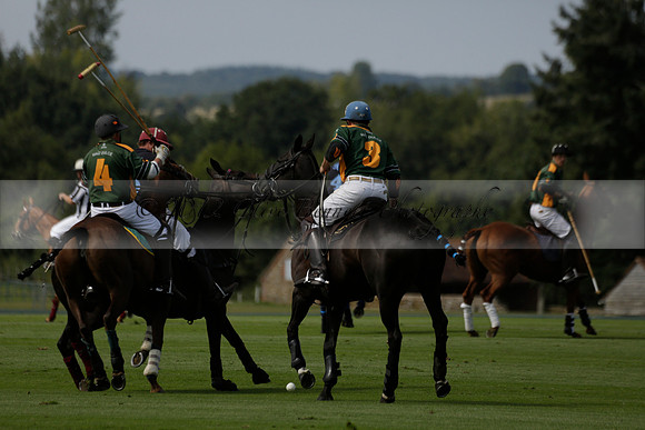 Maiz Dulce (green) v River (blue) in a Uber Polo Midsummer 12 goal polo match on Wednesday 21 August 2013 at Cowdray park Polo Club on Ambersham 2.  www.polopictures.co.uk