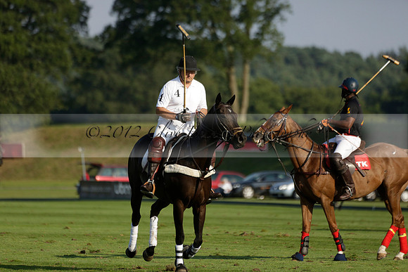 Pluma Negra (white) v Shoreline (black) in the Brecknock Cup Subsidiary final polo match played on Sunday 25 August 2013 at Cowdray Park Polo Club on Ambersham 1. 2013.10.12 www.polopictures.co.uk
