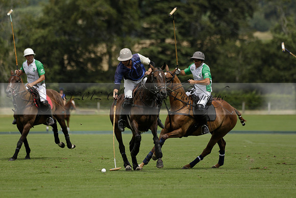 Burningfold (blue) v Wairakei Pastoral (green) in the Ruins Cup Final on Sunday 04 August 2013.