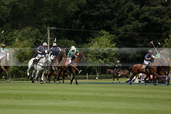 Burningfold (blue) v Wairakei Pastoral (green) in the Ruins Cup Final on Sunday 04 August 2013.