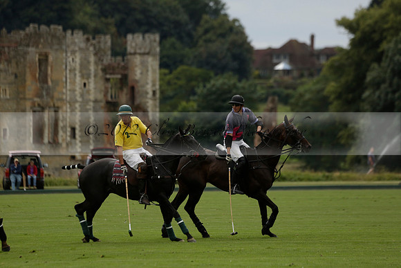 La Tremenda (lilac) v Maiz Dulce (yellow) in a Brecknock Cup polo match played on Lawns 1 at the Cowdray Park Polo Club on Tuesday 13 August 2013