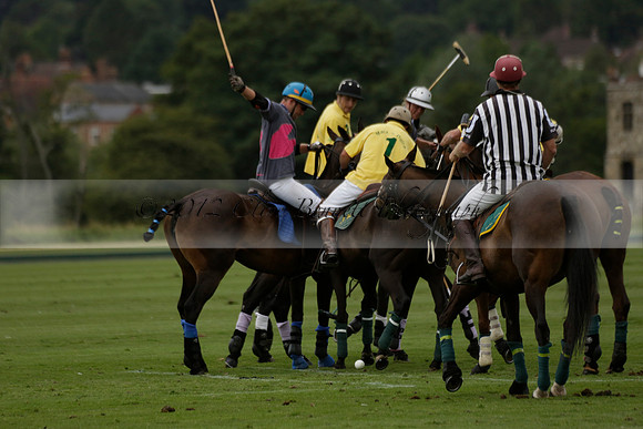 La Tremenda (lilac) v Maiz Dulce (yellow) in a Brecknock Cup polo match played on Lawns 1 at the Cowdray Park Polo Club on Tuesday 13 August 2013