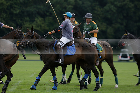 La Tremenda (mauve) v Maiz Dulce (green) in the Brecknock Cup  final polo match. Played at Cowdray Park Polo Club on Sunday 25 August 2013 on Ambersham 1. www.polopictures.co.uk