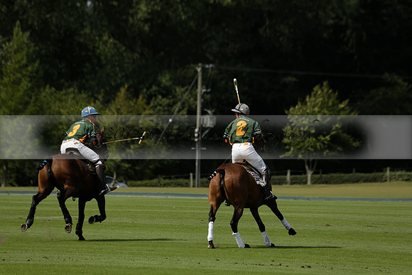 Maiz Dulce (green) v River (blue) in a Uber Polo Midsummer 12 goal polo match on Wednesday 21 August 2013 at Cowdray park Polo Club on Ambersham 2.  www.polopictures.co.uk
