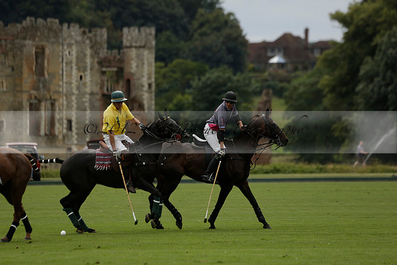 La Tremenda (lilac) v Maiz Dulce (yellow) in a Brecknock Cup polo match played on Lawns 1 at the Cowdray Park Polo Club on Tuesday 13 August 2013