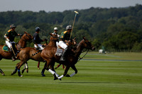 Maiz Dulce (green) v River (blue) in a Uber Polo Midsummer 12 goal polo match on Wednesday 21 August 2013 at Cowdray park Polo Club on Ambersham 2.  www.polopictures.co.uk