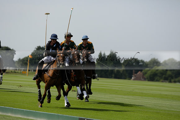 Maiz Dulce (green) v River (blue) in a Uber Polo Midsummer 12 goal polo match on Wednesday 21 August 2013 at Cowdray park Polo Club on Ambersham 2.  www.polopictures.co.uk