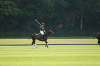 La Tremenda (mauve) v Maiz Dulce (green) in the Brecknock Cup  final polo match. Played at Cowdray Park Polo Club on Sunday 25 August 2013 on Ambersham 1. www.polopictures.co.uk
