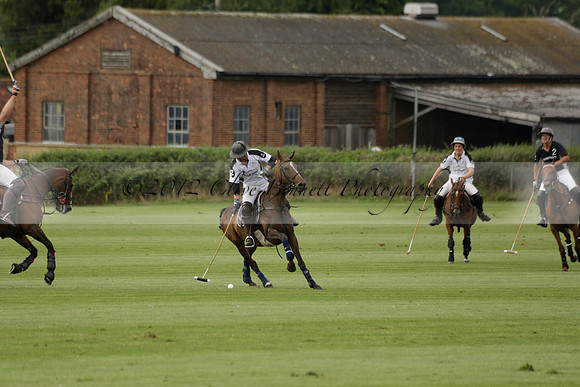 Beau Design v Boscom in an August Rother Cup 4 goal polo match at Cowdray Park Polo Club on Wednesday 07 August 2013