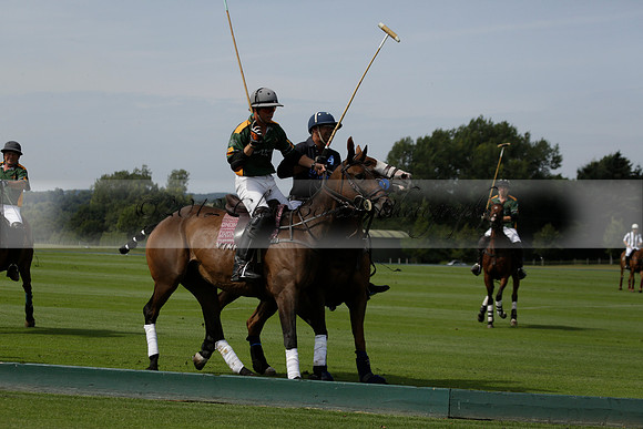 Maiz Dulce (green) v River (blue) in a Uber Polo Midsummer 12 goal polo match on Wednesday 21 August 2013 at Cowdray park Polo Club on Ambersham 2.  www.polopictures.co.uk