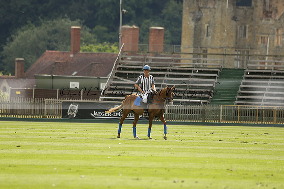 La Tremenda (lilac) v Maiz Dulce (yellow) in a Brecknock Cup polo match played on Lawns 1 at the Cowdray Park Polo Club on Tuesday 13 August 2013