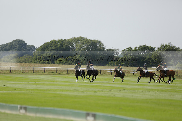 Maiz Dulce (green) v River (blue) in a Uber Polo Midsummer 12 goal polo match on Wednesday 21 August 2013 at Cowdray park Polo Club on Ambersham 2.  www.polopictures.co.uk