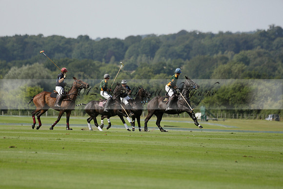 Maiz Dulce (green) v River (blue) in a Uber Polo Midsummer 12 goal polo match on Wednesday 21 August 2013 at Cowdray park Polo Club on Ambersham 2.  www.polopictures.co.uk