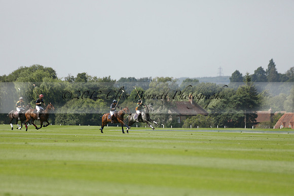 Maiz Dulce (green) v River (blue) in a Uber Polo Midsummer 12 goal polo match on Wednesday 21 August 2013 at Cowdray park Polo Club on Ambersham 2.  www.polopictures.co.uk