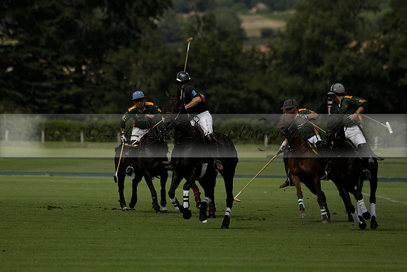 Maiz Dulce (green) v River (blue) in a Uber Polo Midsummer 12 goal polo match on Wednesday 21 August 2013 at Cowdray park Polo Club on Ambersham 2.  www.polopictures.co.uk