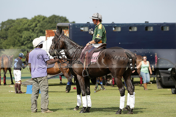 Maiz Dulce (green) v River (blue) in a Uber Polo Midsummer 12 goal polo match on Wednesday 21 August 2013 at Cowdray park Polo Club on Ambersham 2.  www.polopictures.co.uk