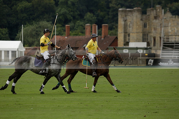 La Tremenda (lilac) v Maiz Dulce (yellow) in a Brecknock Cup polo match played on Lawns 1 at the Cowdray Park Polo Club on Tuesday 13 August 2013