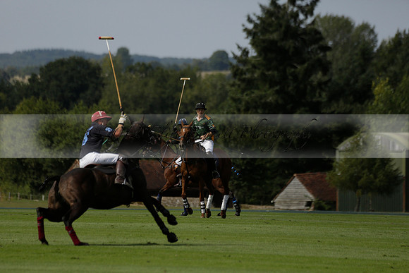 Maiz Dulce (green) v River (blue) in a Uber Polo Midsummer 12 goal polo match on Wednesday 21 August 2013 at Cowdray park Polo Club on Ambersham 2.  www.polopictures.co.uk