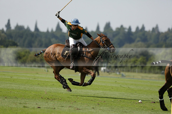 Maiz Dulce (green) v River (blue) in a Uber Polo Midsummer 12 goal polo match on Wednesday 21 August 2013 at Cowdray park Polo Club on Ambersham 2.  www.polopictures.co.uk