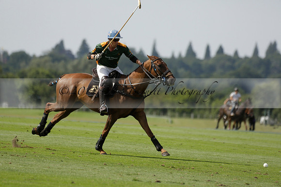 Maiz Dulce (green) v River (blue) in a Uber Polo Midsummer 12 goal polo match on Wednesday 21 August 2013 at Cowdray park Polo Club on Ambersham 2.  www.polopictures.co.uk