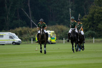 La Tremenda (mauve) v Maiz Dulce (green) in the Brecknock Cup  final polo match. Played at Cowdray Park Polo Club on Sunday 25 August 2013 on Ambersham 1. www.polopictures.co.uk