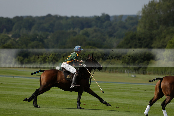 Maiz Dulce (green) v River (blue) in a Uber Polo Midsummer 12 goal polo match on Wednesday 21 August 2013 at Cowdray park Polo Club on Ambersham 2.  www.polopictures.co.uk