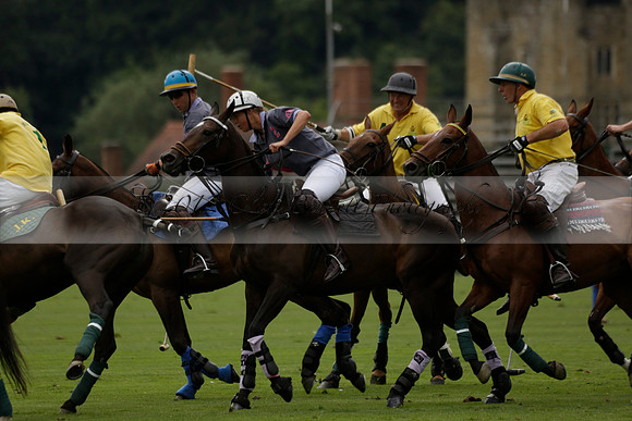 La Tremenda (lilac) v Maiz Dulce (yellow) in a Brecknock Cup polo match played on Lawns 1 at the Cowdray Park Polo Club on Tuesday 13 August 2013