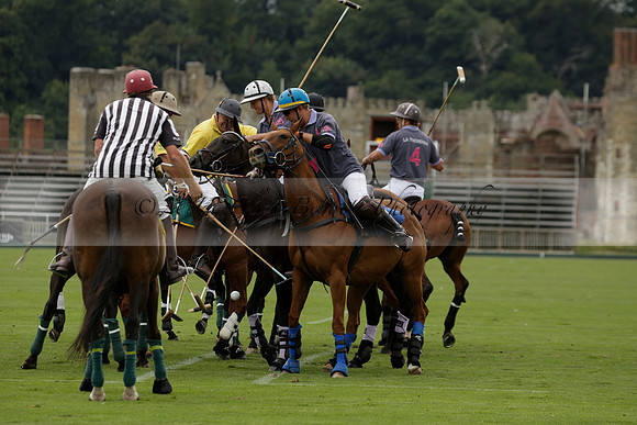 La Tremenda (lilac) v Maiz Dulce (yellow) in a Brecknock Cup polo match played on Lawns 1 at the Cowdray Park Polo Club on Tuesday 13 August 2013