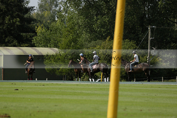 Maiz Dulce (green) v River (blue) in a Uber Polo Midsummer 12 goal polo match on Wednesday 21 August 2013 at Cowdray park Polo Club on Ambersham 2.  www.polopictures.co.uk
