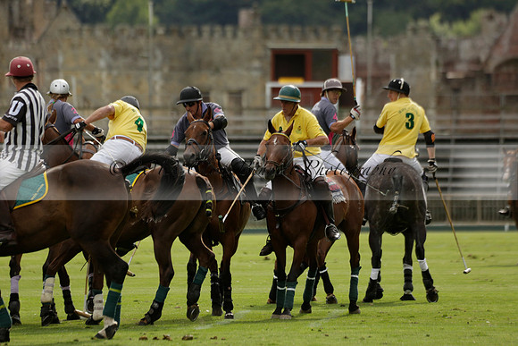 La Tremenda (lilac) v Maiz Dulce (yellow) in a Brecknock Cup polo match played on Lawns 1 at the Cowdray Park Polo Club on Tuesday 13 August 2013
