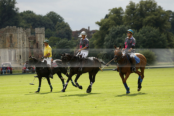 La Tremenda (lilac) v Maiz Dulce (yellow) in a Brecknock Cup polo match played on Lawns 1 at the Cowdray Park Polo Club on Tuesday 13 August 2013