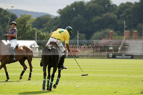 La Tremenda (lilac) v Maiz Dulce (yellow) in a Brecknock Cup polo match played on Lawns 1 at the Cowdray Park Polo Club on Tuesday 13 August 2013