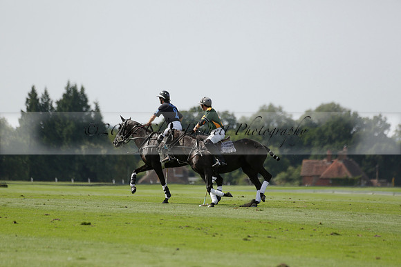 Maiz Dulce (green) v River (blue) in a Uber Polo Midsummer 12 goal polo match on Wednesday 21 August 2013 at Cowdray park Polo Club on Ambersham 2.  www.polopictures.co.uk