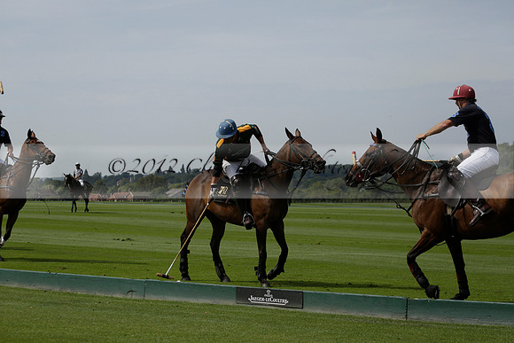 Maiz Dulce (green) v River (blue) in a Uber Polo Midsummer 12 goal polo match on Wednesday 21 August 2013 at Cowdray park Polo Club on Ambersham 2.  www.polopictures.co.uk