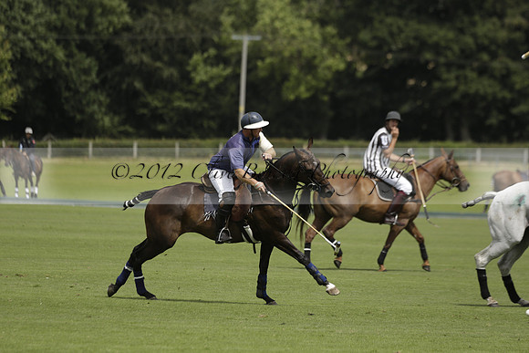 Burningfold (blue) v Wairakei Pastoral (green) in the Ruins Cup Final on Sunday 04 August 2013.
