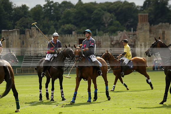 La Tremenda (lilac) v Maiz Dulce (yellow) in a Brecknock Cup polo match played on Lawns 1 at the Cowdray Park Polo Club on Tuesday 13 August 2013