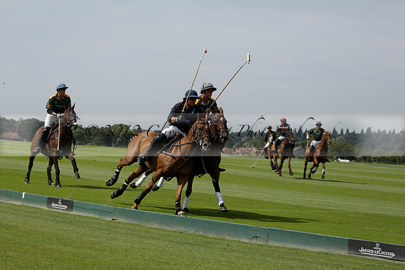 Maiz Dulce (green) v River (blue) in a Uber Polo Midsummer 12 goal polo match on Wednesday 21 August 2013 at Cowdray park Polo Club on Ambersham 2.  www.polopictures.co.uk