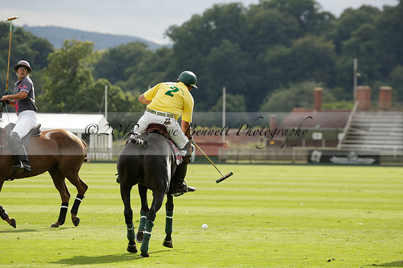 La Tremenda (lilac) v Maiz Dulce (yellow) in a Brecknock Cup polo match played on Lawns 1 at the Cowdray Park Polo Club on Tuesday 13 August 2013